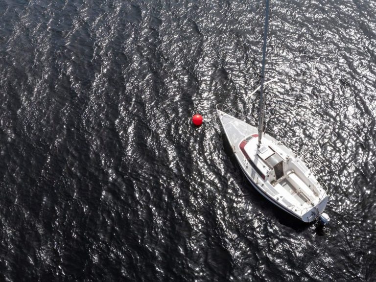 Aerial image of boat illustrates blog: "5 Ideas for Reducing Your Boat Insurance Costs"