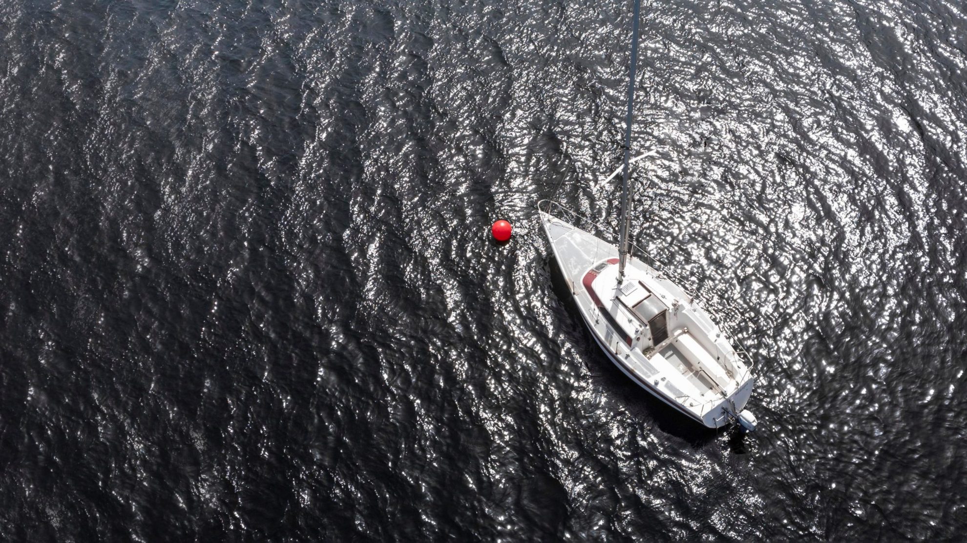 BoatInsuranceRates Aerial image of boat illustrates blog: "5 Ideas for Reducing Your Boat Insurance Costs"