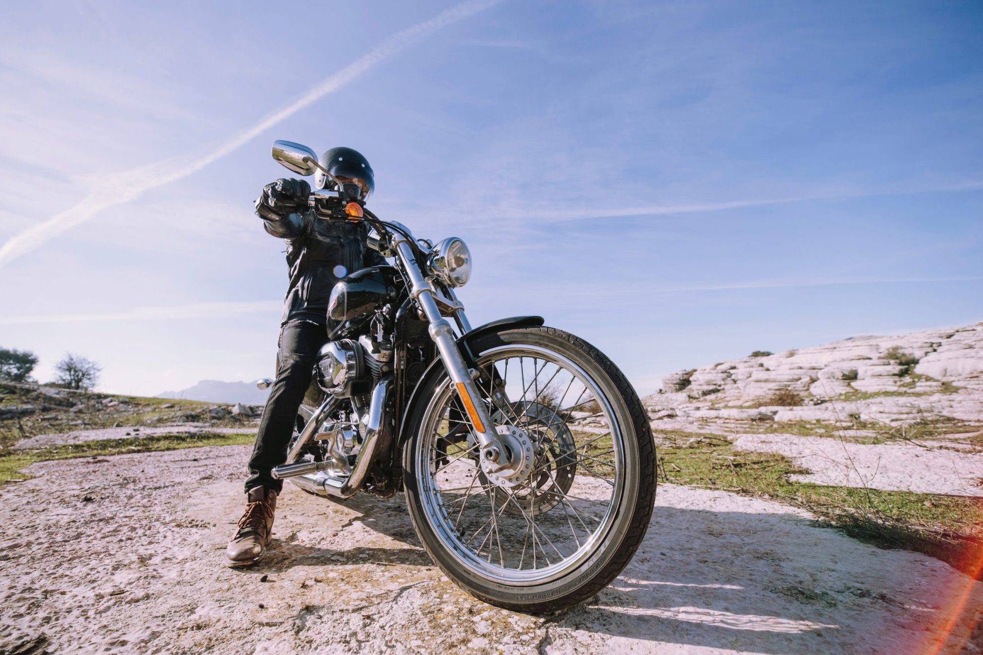 Image of man on motorcycle illustrates blog: "5 ways to save on motorcycle insurance"