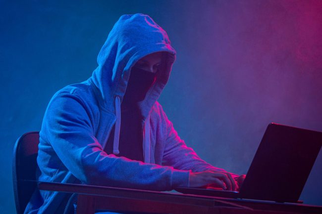 Photo of cybercriminal illustrates blog: "What Is Spear Phishing?"