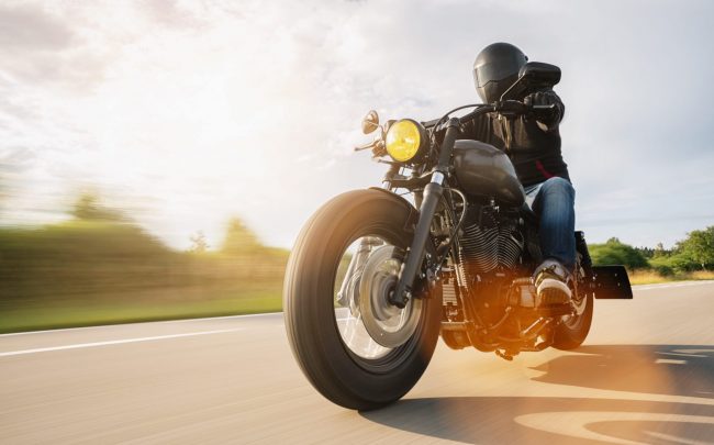 Photo of person riding a motorcycle