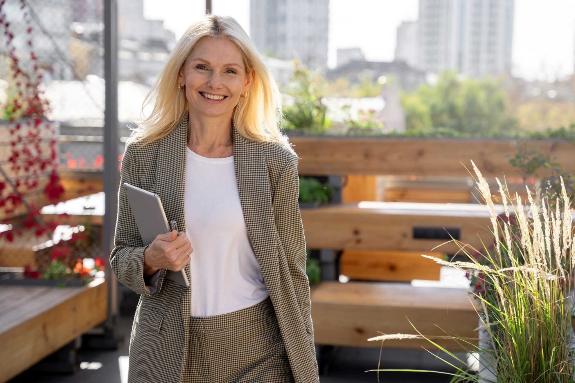 BusinessWoman5 Smiling business woman illustrates blog "What Is Excluded From a Business Owners Policy (BOP)?"