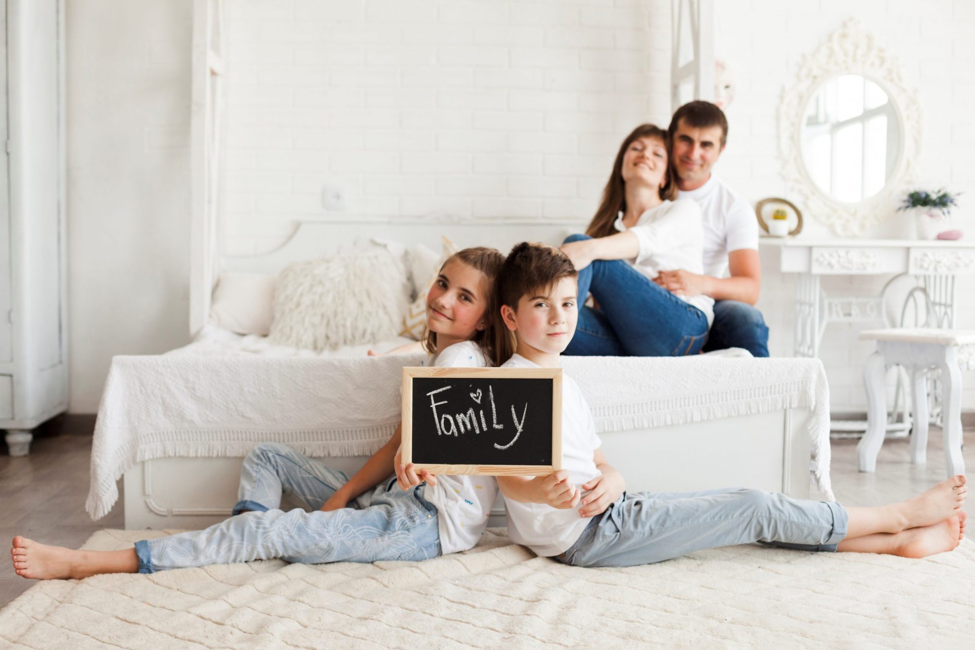 FamilyHomeInsurance Family in bedroom illustrates blog "Protect Your Home with These 5 Home Insurance Tips"