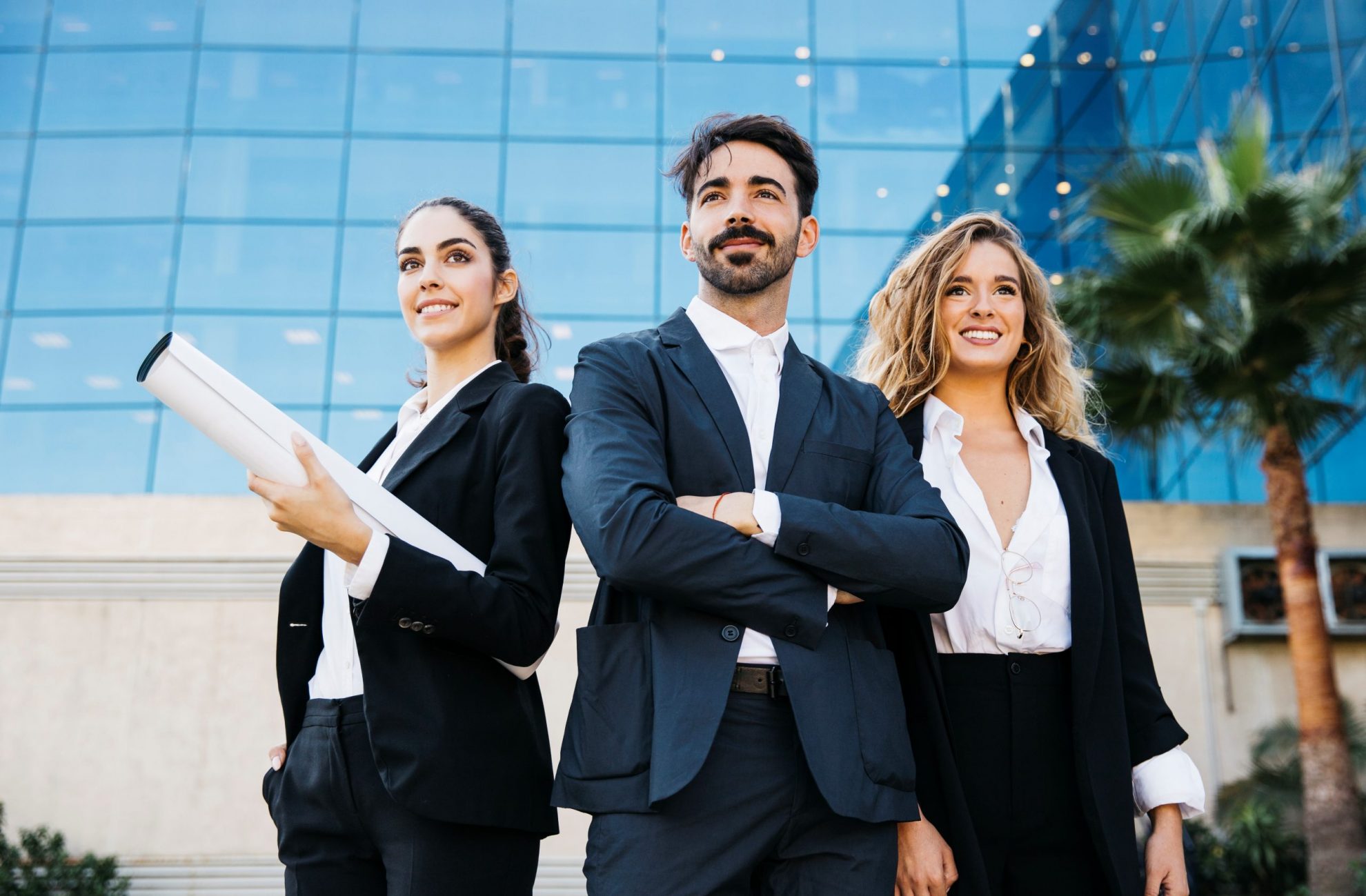 executives-FP Three executives in business attire illustrate blog "What Is an S Corporation?"