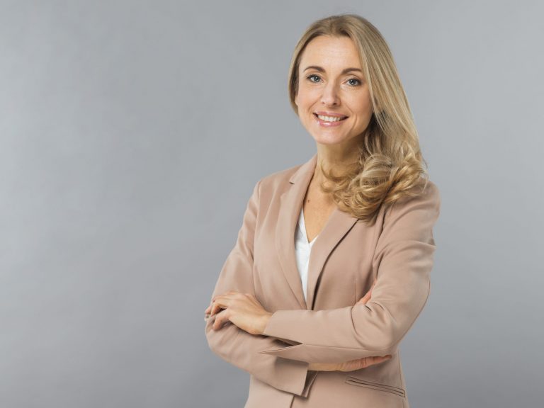 businesswoman-fp5 Smiling businesswoman illustrates blog "How Much Insurance Does My Business Need? "