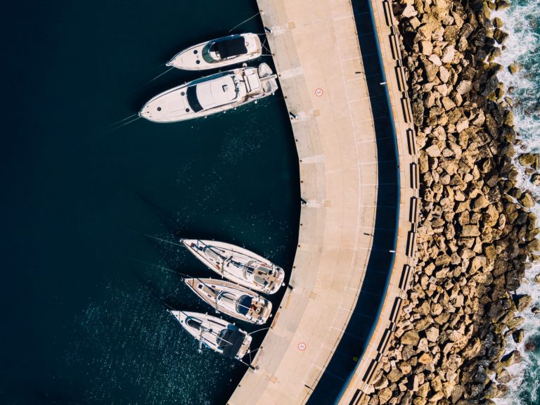 boat-insurance-wirestock Aerial view of boats illustrates blog "Does Boat Insurance Cover Hurricane Damage?"