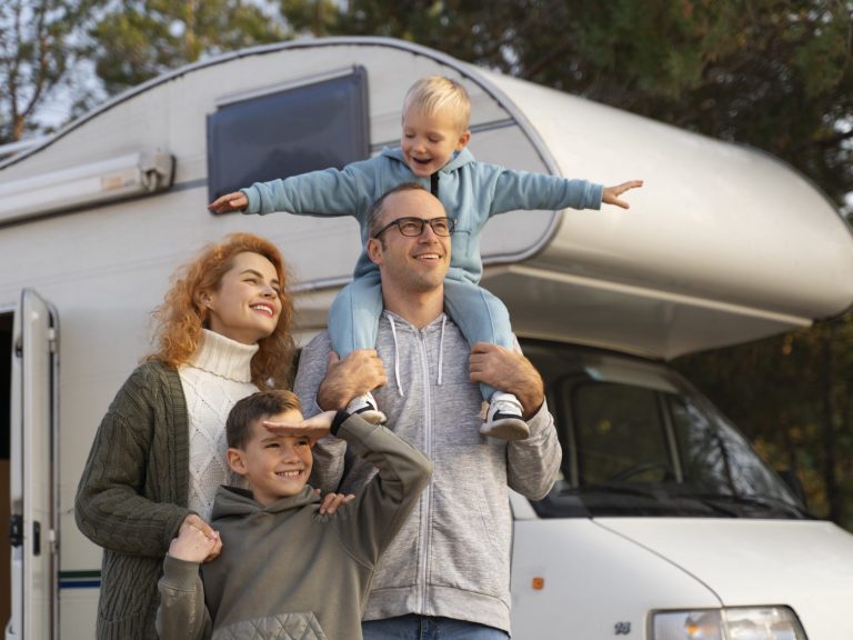 rvinsurance-fp Mother,, father, and son with RV