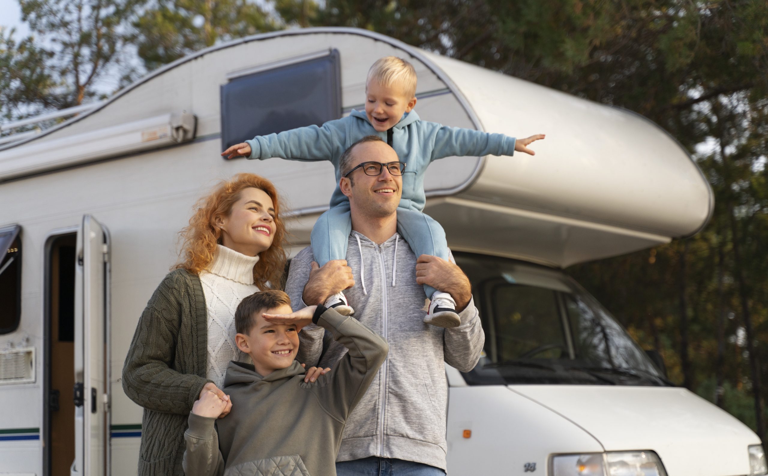 rvinsurance-fp Mother,, father, and son with RV