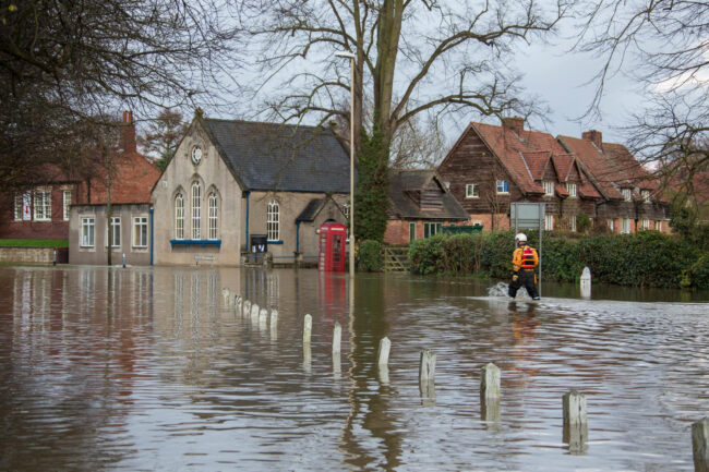 address_in_flood_zone Entering address in flood zone search tool to find insurance risk level