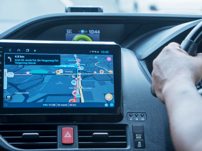 driver-car-with-gps-navigation-device usage-based auto insurance California telematics device