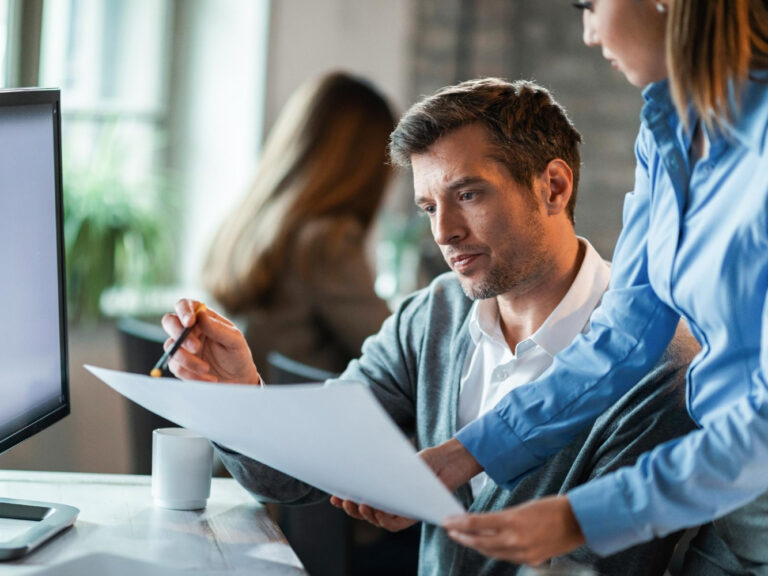 1081 insurance advisor explaining cyber liability insurance to small business owner